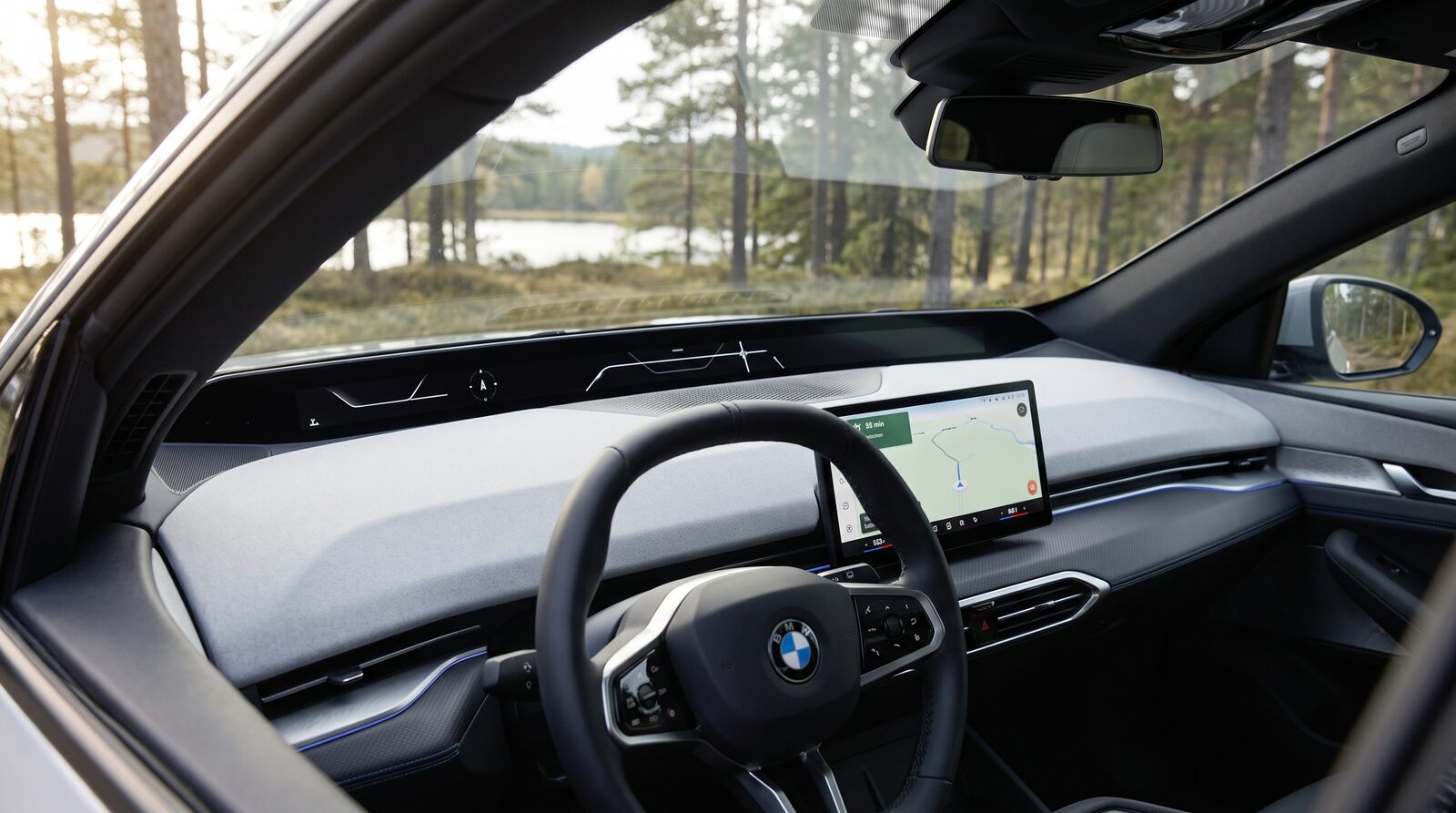 Förarmiljön i en modern BMW Neue Klasse-cockpit med Panoramic iDrive