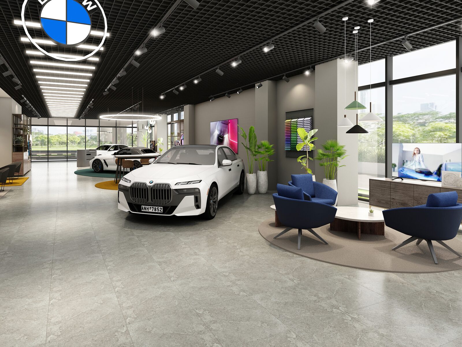 Modern BMW-bilhall med en vit BMW 7-serie och en sittgrupp med blå fåtöljer